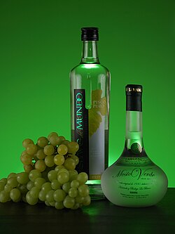 Compositioned picture of two bottles of Pisco produced in Peru