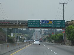 Carretera Panamericana westbound at Nejapa. Note "CA-1 A", signage for alternative CA-1, north bypass of San Salvador.