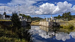 The Little Oso Diversion Dam diverts water from the Little Navajo River and transports it through a series of tunnels into the Rio Grande basin as part of the San Juan–Chama Project.