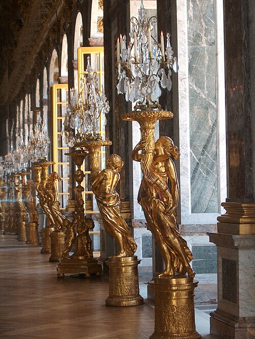Sculptured torchères replaced the 1689 melted down silver guéridons.