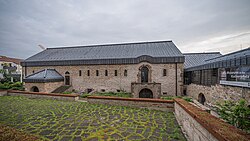 The reconstructed aula regia of the Paderborn pfalz, built around 1015. The lighter stones and the foundations are original.