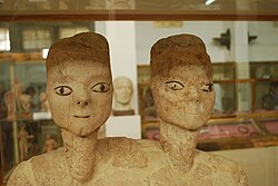 The ʿAin Ghazal statues, which are considered to be the oldest large-scale human statues ever found, on display at the Jordan Archaeological Museum[20]