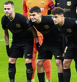 Pedri (centre) lining up for Barcelona in 2020