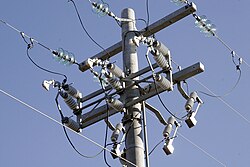 The top of a power pole
