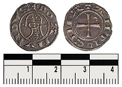 A rather unusual coin in the name of Bohemond. A bust sits in profile wearing a round helmet emblazoned with a cross with a prominent nasal-guard and a mail coif covering the neck. (1163–1201)