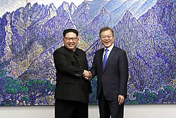 Kim Jong Un and South Korean President Moon Jae-in shake hands during the inter-Korean Summit, April 2018