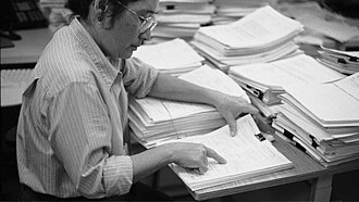 A reviewer at the American National Institutes of Health evaluating a grant proposal