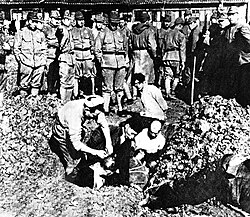 Japanese troops burying living Chinese civilians