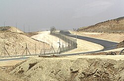 The Israeli West Bank barrier is a separation barrier built by Israel along the Green Line and inside parts of the West Bank.