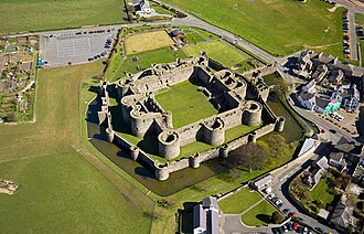 Beaumaris Castle in Anglesey, North Wales, with curtain walls between the lower outer towers, and higher inner curtain walls between the higher inner towers.