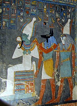 Egyptian tomb painting showing the gods Osiris, Anubis, and Horus, who are among the major deities in ancient Egyptian religion[88]