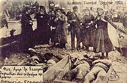 Greek civilians mourn their relatives killed in the Great Fire of Smyrna during the Greek genocide in 1922.