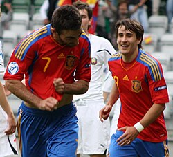Bojan (no. 9) with teammate Adrián (no. 7) with Spain U21 after Adrián scores in their European Under-21 Championship semi-final match against Belarus