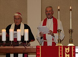 Bishop John M. Quinn (left) of the Roman Catholic Diocese of Winona and Bishop Steven Delzer of Evangelical Lutheran Southeastern Minnesota Synod leading a Reformation Day service in 2017