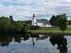 The Flambeau Mission Church, the first church in the county, was built around 1884. It served the Ojibwe, loggers and settlers.