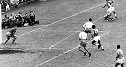 Garrincha crosses the ball to Vavá in the 1958 FIFA World Cup Final.
