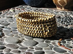 A traditional Yahgan basket, woven with smoked Juncus effusus by Abuela Cristina