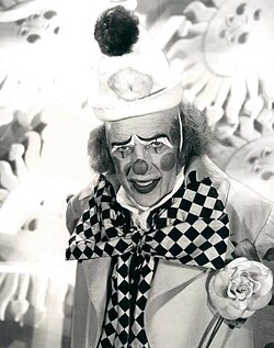 Sullivan, in full clown regalia, hosting the 1972 special Clownaround