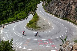 Stage 19 finished at the top of Alpe d'Huez; the climb is 13.8 km (8.6 mi) long, an average gradient of 7.9% and features 21 hairpin turns.