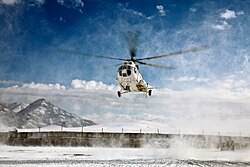 Russian made Mil Mi-8 chopper landing at Forward Operating Base Airborne to deliver mail and supplies, 2009