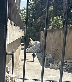 The monument in the parking lot of Aleppo National Museum in August 2026