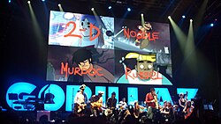 A graphic on-stage at the Escape to Plastic Beach Tour showing the virtual members.
