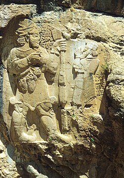 İvriz relief, with God Teshub (on the left) and king Warpalawas (ca 730-710 BCE) (right)