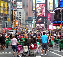 Travel + Leisure magazine's October 2011 survey named Times Square in Midtown Manhattan, iconified as the "Crossroads of the World",[269][270][271][272][273] the world's most visited tourist attraction with over 39 million visitors annually.[274]