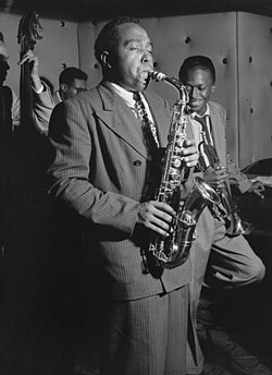 The "classic quintet": Charlie Parker, Tommy Potter, Miles Davis, Dizzy Gillespie, and Max Roach performing at Three Deuces in New York City. Photograph by William P. Gottlieb (August 1947), Library of Congress.