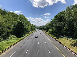 View south along the northbound lanes of the Garden State Parkway from the overpass for the Capital to Coast Trail in Wall Township, Monmouth County, New Jersey.