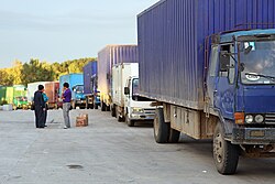 Trucks queued waiting for the border crossing between Quanhe and Wonjong to open.