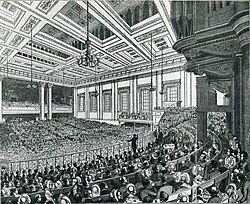 In 19th-century Britain, the protectionist Corn Laws led to high prices and widespread protest, such as this 1846 meeting of the Anti–Corn Law League.[257]