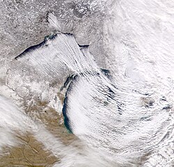 Cold northwesterly wind over the Great Lakes creating lake-effect snow. Lake-effect snow most frequently occurs in the snowbelt regions of the province.