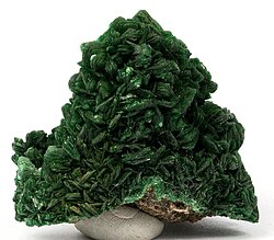 A sample of a high-quality uranium-bearing ore (Tobernite) from the Shinkolobwe mine in Belgian Congo