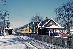 A CNW North Line train stops at Wilmette, Illinois, in 1963.