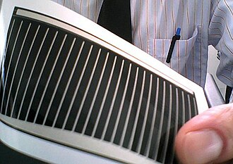 CIGS cell on a flexible plastic backing. Other architectures use rigid CIGS panels sandwiched between two panes of glass.