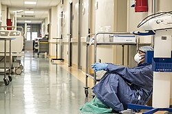 An exhausted anaesthesiologist in Pesaro, Italy, 19 March 2020
