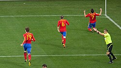 Llorente (far left) joins Andrés Iniesta and goalscorer David Villa in celebration of Spain's goal against Portugal at the 2010 FIFA World Cup