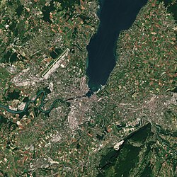 Satellite view of Geneva; Cointrin Airport is centre left. The Salève (in France) is the large area of green at the bottom right.
