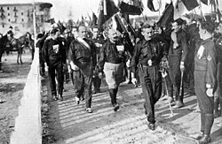 Benito Mussolini (second from left) and his Fascist Blackshirts in 1920