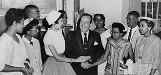 The nine students greeting New York mayor Robert F. Wagner Jr. in 1958