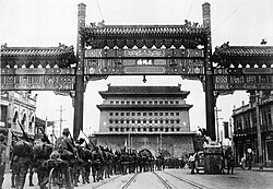 The Japanese occupation of Beiping (Beijing) in China, on August 13, 1937. Japanese troops are shown passing from Beiping into the Tartar City through Zhengyangmen, the main gate leading onward to the palaces in the Forbidden City.