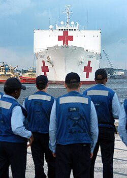 USNS Comfort takes on supplies at Mayport, Florida, en route to the Gulf Coast.
