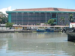 View of the Bureau of Immigration Building from Binondo across the Pasig River.