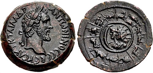 Roman Egyptian coin of Antoninus Pius (dated year 8 of his reign or 145 AD) showing his portrait and a Zodiac wheel with the busts of Helios and Selene in the center