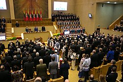 Commemoration of the Act of the Re-Establishment of the State of Lithuania in the historical Seimas hall where it was originally signed in 1990. The ceremony is attended by the Lithuanian President, Prime Minister, Chairman of the Seimas and other high-ranking officials.