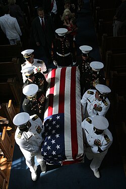 Pallbearers carrying the casket of Major Douglas A. Zembiec of the United States Marine Corps