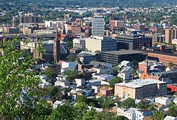 Paterson, Passaic County, New Jersey, known as the "Silk City",[109] seen here from Garret Mountain Reservation, is a prime destination for a diverse pool of international immigrants.[110][111]