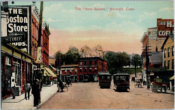 1912 postcard with the Norwalk Hour building at center