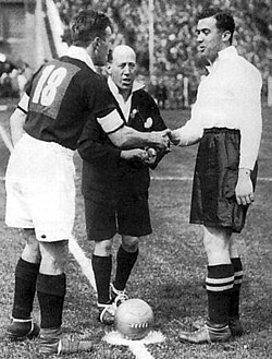 Sam Cowan (18) and Dixie Dean, captains of Manchester City and Everton, before the match